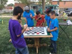 boys playing checkers